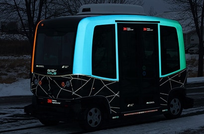 MnDOT’s Autonomous Shuttle Bus, showing glowing at dusk